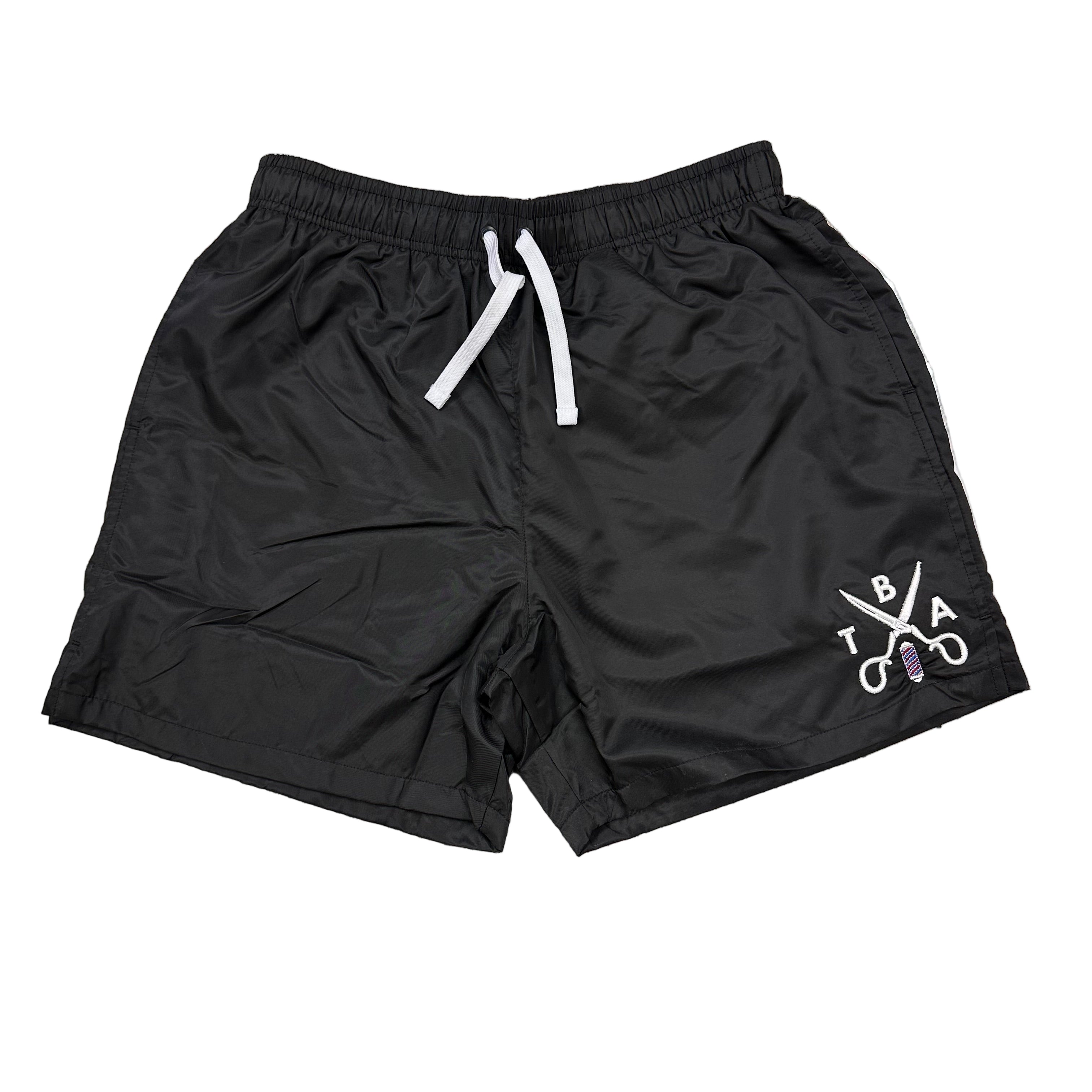 Black shorts with a logo on a white background